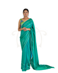 Green Blue Kit Kat Satin Plain Saree with Silver Gota Patti with Pearl Border and Green Abstract Floral Embroidered Blouse Set.