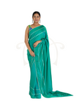 Green Blue Kit Kat Satin Plain Saree with Silver Gota Patti with Pearl Border and Green Abstract Floral Embroidered Blouse Set.